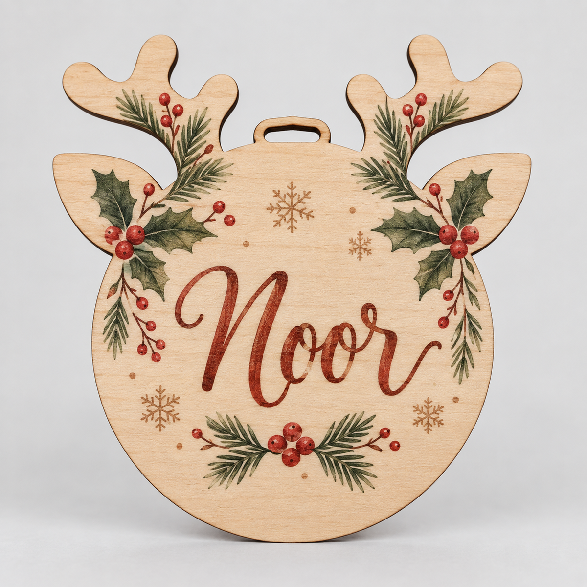 Gepersonaliseerde kerstdecoratie van hout met naam in rendiervorm